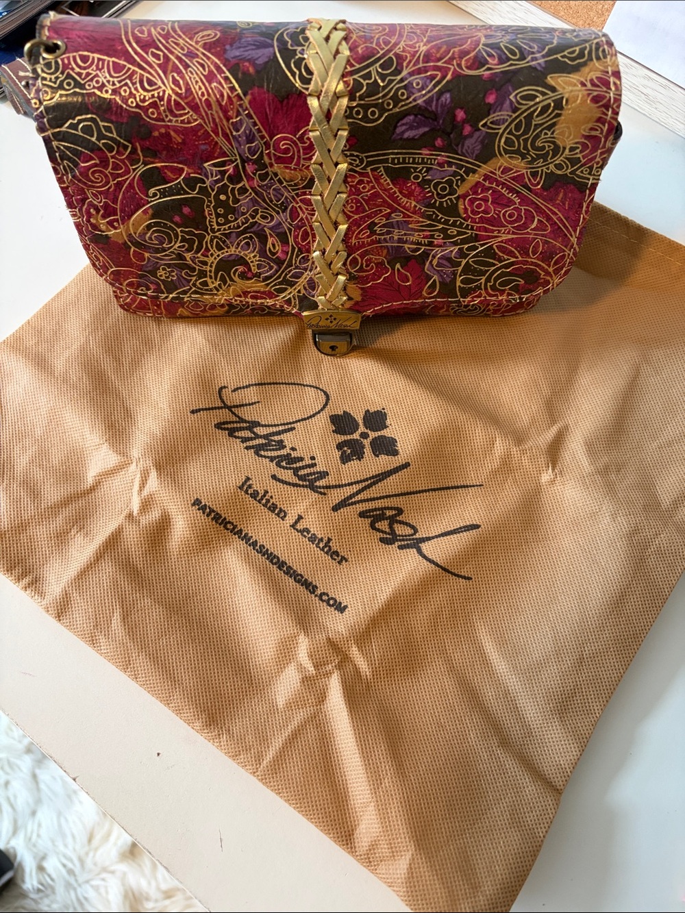 Patricia Nash Red and Gold Floral Embossed Leather Clutch